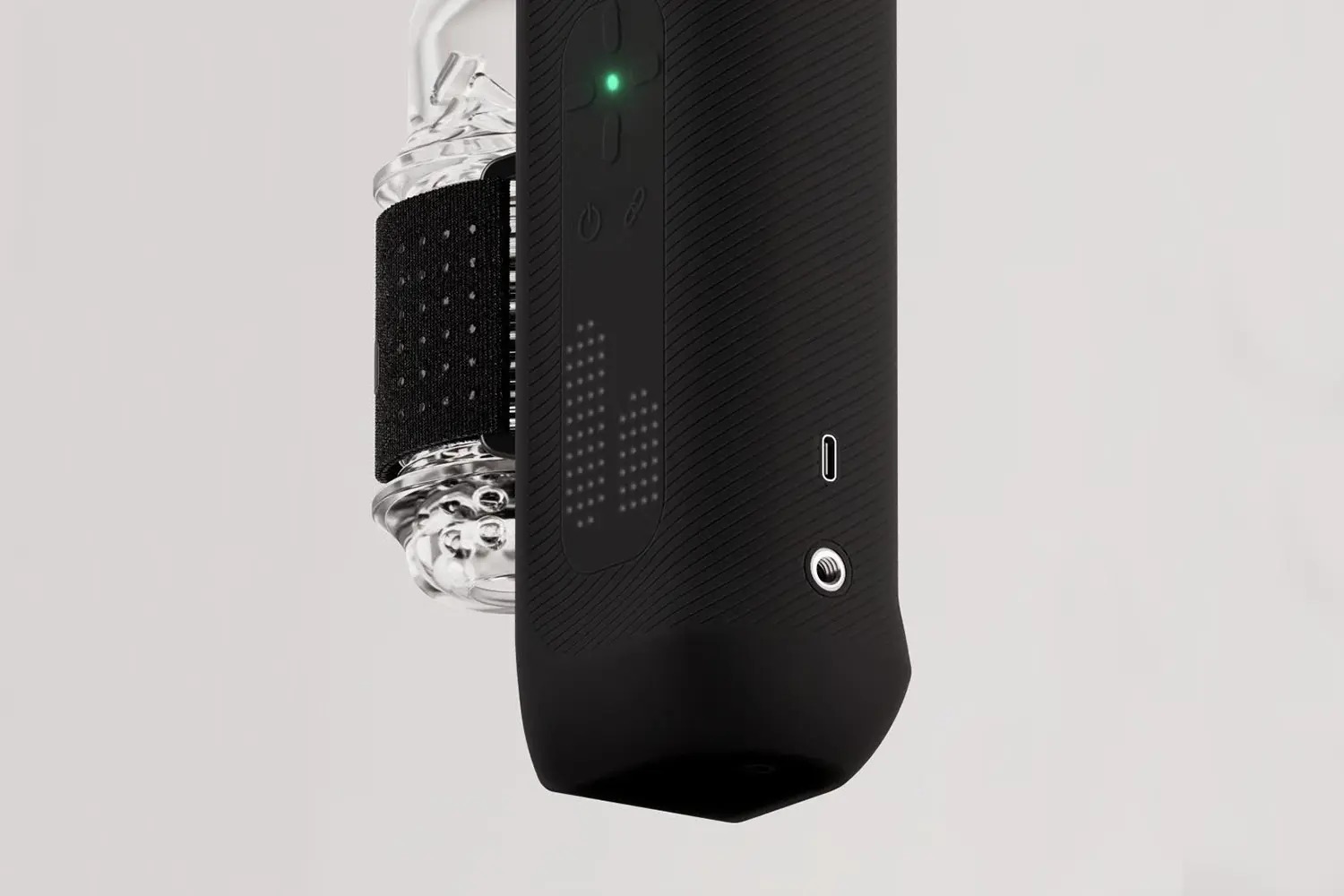 The Handy 2 underside detail: LED dot display, USB-C charging port, and ClickOn-mounted clear textured sleeve